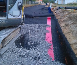 Zpevnění podkladní vrstvy komunikace u Šebetova